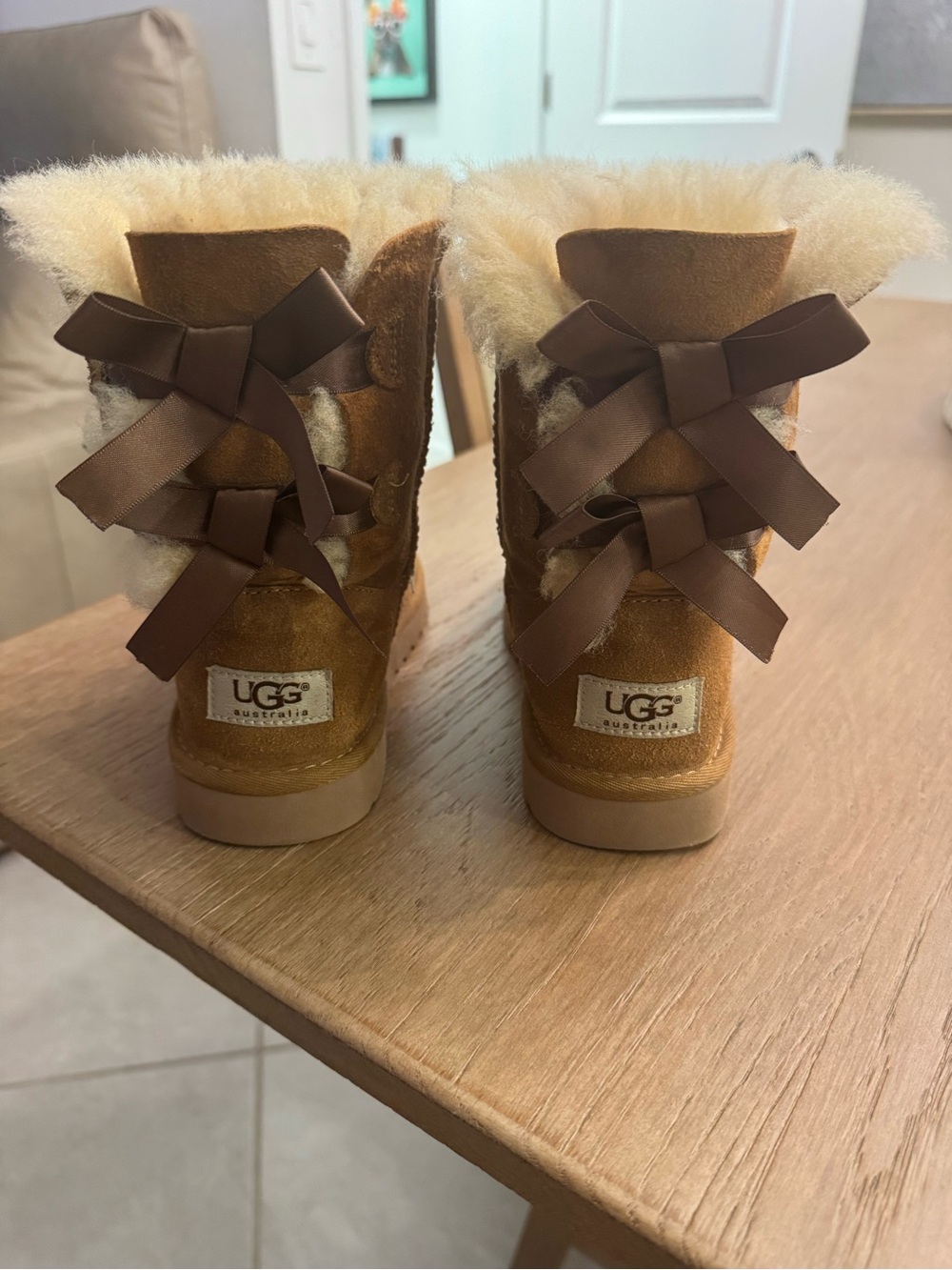 UGG Chestnut Shearling Mini Boots with Back Ribbon Bows